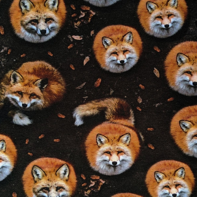 Digiprint cotton jersey foxes on dark brown GOTS